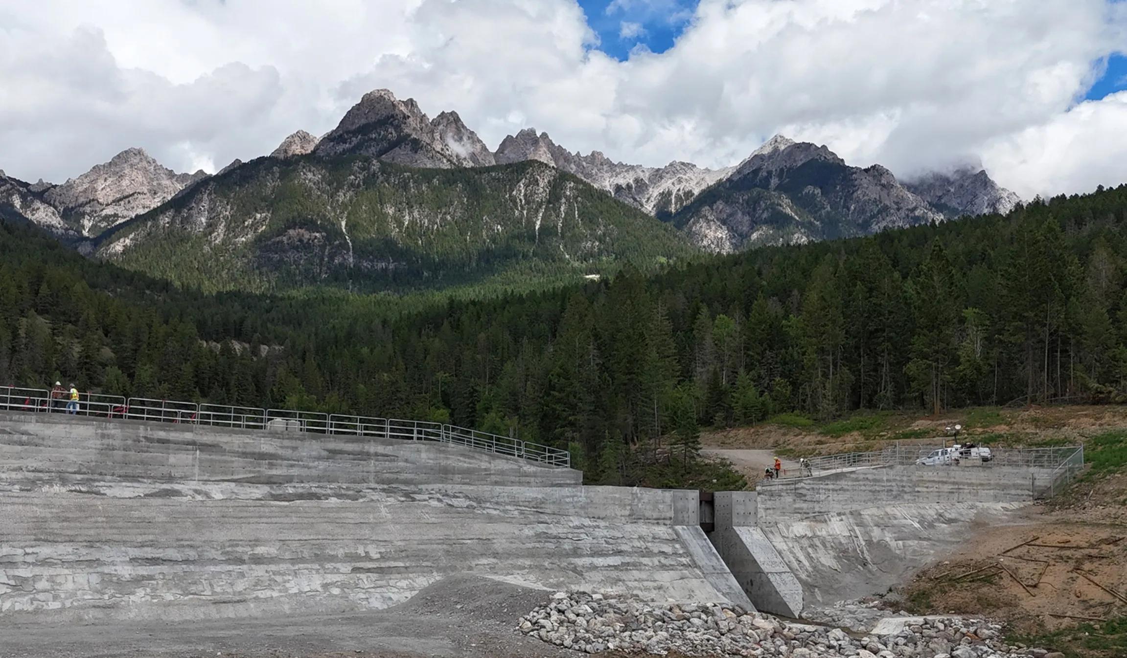Completed roller-compacted concrete debris-flow dam below the Fairmont peaks