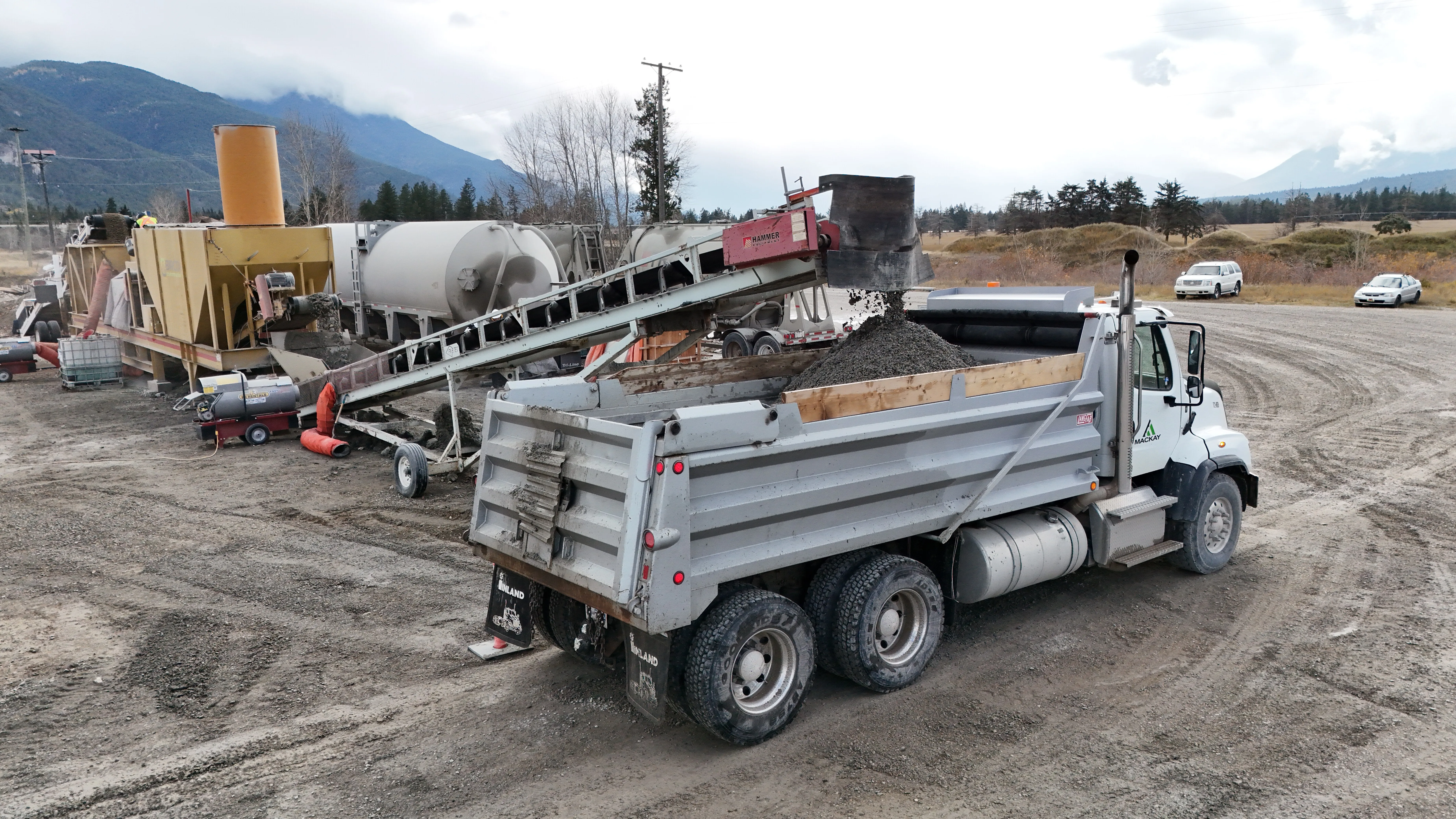 Crushing plant loading a Mackay dump truck with processed aggregate